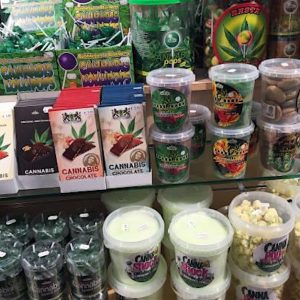Cannabis products aligned on a market shelf